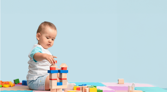 Child playing with building blocks background